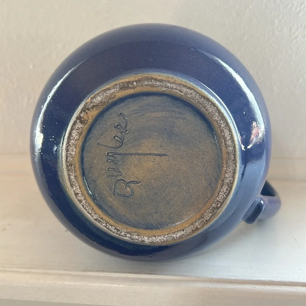 Handmade pottery pitcher blue glaze with handle